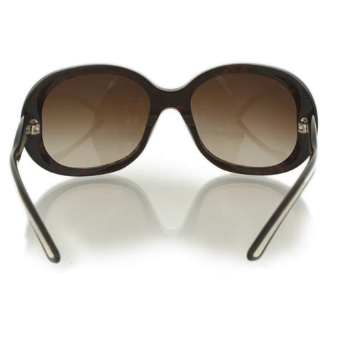 Prada Sunglasses SPR 65H 61014 Brown. 